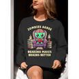Halloween Teacher Zombie Reading Is Good For Brains Women Crewneck Sweatshirt, funny gift Halloween Teacher Zombie Reading Is Good For Brains Women Crewneck Sweatshirt, funny gift