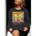 Interventionist Teacher Groovy Coquette Bow Back To School Women Crewneck Sweatshirt, Groovy Teacher Sweatshirts, funny gift