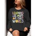 Learning Is Out Of This World Space Teacher Cute Groovy Women Crewneck Sweatshirt, Groovy Teacher Sweatshirts, funny gift Learning Is Out Of This World Space Teacher Cute Groovy Women Crewneck Sweatshirt, Groovy Teacher Sweatshirts, funny gift