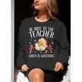 Be Nice To The Teacher Santa Is Watching School Christmas Women Crewneck Sweatshirt, funny gift Be Nice To The Teacher Santa Is Watching School Christmas Women Crewneck Sweatshirt, funny gift