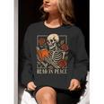 Read In Peace Skeleton Reading Book Halloween Teacher Women Crewneck Sweatshirt, funny gift Read In Peace Skeleton Reading Book Halloween Teacher Women Crewneck Sweatshirt, funny gift