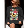 Santas Favorite Teacher Retro Groovy Smile Face Christmas Women Crewneck Sweatshirt, Groovy Teacher Sweatshirts, funny gift