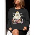 Spooky Teacher Groovy Retro Ghost Teacher Halloween 2023 For Men Women Kids Women Crewneck Sweatshirt, Groovy Teacher Sweatshirts, funny gift