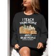 I Teach Young People About Dead People History Teachers Women Crewneck Sweatshirt, History Teacher Sweatshirts, funny gift I Teach Young People About Dead People History Teachers Women Crewneck Sweatshirt, History Teacher Sweatshirts, funny gift