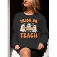 Teacher Halloween Trick Or Teach Retro Groovy Floral Ghost Women Crewneck Sweatshirt, Groovy Teacher Sweatshirts, funny gift Teacher Halloween Trick Or Teach Retro Groovy Floral Ghost Women Crewneck Sweatshirt, Groovy Teacher Sweatshirts, funny gift