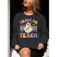 Trick Or Teach Groovy Halloween Teachers Women Crewneck Sweatshirt, funny gift