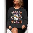 Trick Or Teach Groovy Teacher Halloween Retro Ghost Women Crewneck Sweatshirt, Groovy Teacher Sweatshirts, funny gift