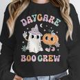 Daycare Boo Crew Groovy Halloween Floral Ghost Kid Teacher Women Crewneck Sweatshirt, Groovy Teacher Gifts, funny design