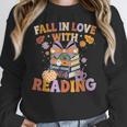 Fall In Love With Reading Halloween Stack Of Book Teacher Women Crewneck Sweatshirt, funny design Fall In Love With Reading Halloween Stack Of Book Teacher Women Crewneck Sweatshirt, funny design