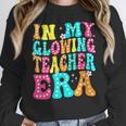 In My Glowing Teacher Era Groovy Colorful Bright Women Crewneck Sweatshirt, Groovy Teacher Gifts, funny design In My Glowing Teacher Era Groovy Colorful Bright Women Crewneck Sweatshirt, Groovy Teacher Gifts, funny design