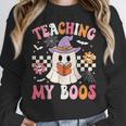 Groovy Teaching My Boos Teacher Ghost Halloween Teacher Women Crewneck Sweatshirt, Groovy Teacher Gifts, funny design Groovy Teaching My Boos Teacher Ghost Halloween Teacher Women Crewneck Sweatshirt, Groovy Teacher Gifts, funny design