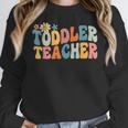 Groovy Toddler Teacher Appreciation Back To School Women Crewneck Sweatshirt, Groovy Teacher Gifts, funny design Groovy Toddler Teacher Appreciation Back To School Women Crewneck Sweatshirt, Groovy Teacher Gifts, funny design