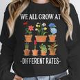 We All Grow At Different Rates Back To School Teacher Women Crewneck Sweatshirt, funny design