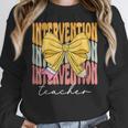 Interventionist Teacher Groovy Coquette Bow Back To School Women Crewneck Sweatshirt, Groovy Teacher Gifts, funny design
