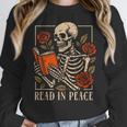 Read In Peace Skeleton Reading Book Halloween Teacher Women Crewneck Sweatshirt, funny design Read In Peace Skeleton Reading Book Halloween Teacher Women Crewneck Sweatshirt, funny design