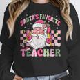 Santa's Favorite Teacher Groovy Christmas Teacher Boys Girls Women Crewneck Sweatshirt, Groovy Teacher Gifts, funny design Santa's Favorite Teacher Groovy Christmas Teacher Boys Girls Women Crewneck Sweatshirt, Groovy Teacher Gifts, funny design