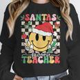 Santas Favorite Teacher Retro Groovy Smile Face Christmas Women Crewneck Sweatshirt, Groovy Teacher Gifts, funny design