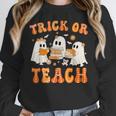 Teacher Halloween Trick Or Teach Retro Groovy Floral Ghost Women Crewneck Sweatshirt, Groovy Teacher Gifts, funny design Teacher Halloween Trick Or Teach Retro Groovy Floral Ghost Women Crewneck Sweatshirt, Groovy Teacher Gifts, funny design