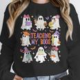Teaching My Boos Teacher Cute Ghost Groovy Teacher Halloween Women Crewneck Sweatshirt, Groovy Teacher Gifts, funny design Teaching My Boos Teacher Cute Ghost Groovy Teacher Halloween Women Crewneck Sweatshirt, Groovy Teacher Gifts, funny design