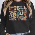I Tell Young People About Dead People Groovy History Teacher Women Crewneck Sweatshirt, History Teacher Gifts, Groovy Teacher Gifts, funny design I Tell Young People About Dead People Groovy History Teacher Women Crewneck Sweatshirt, History Teacher Gifts, Groovy Teacher Gifts, funny design