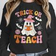 Trick Or Teach Cute Floral Ghost Teacher Halloween Costume Women Crewneck Sweatshirt, funny design