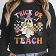 Trick Or Teach Groovy Teacher Halloween Retro Teacher Ghost Women Crewneck Sweatshirt, Groovy Teacher Gifts, funny design Trick Or Teach Groovy Teacher Halloween Retro Teacher Ghost Women Crewneck Sweatshirt, Groovy Teacher Gifts, funny design