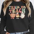 Trick Or Teach Pumpkin Candy Corn Ghost Halloween Teacher Women Crewneck Sweatshirt, funny design Trick Or Teach Pumpkin Candy Corn Ghost Halloween Teacher Women Crewneck Sweatshirt, funny design