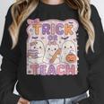 Trick Or Teach Retro Halloween Teacher Look Women Crewneck Sweatshirt, funny design Trick Or Teach Retro Halloween Teacher Look Women Crewneck Sweatshirt, funny design