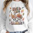 Fall In Love With Learning Teacher Autumn School Women Crewneck Sweatshirt, funny design Fall In Love With Learning Teacher Autumn School Women Crewneck Sweatshirt, funny design