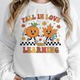 Fall In Love With Learning Teacher Student Autumn Pumpkin Women Crewneck Sweatshirt, funny design Fall In Love With Learning Teacher Student Autumn Pumpkin Women Crewneck Sweatshirt, funny design