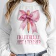 I'm Literally Just a Teacher Pencil Coquette Bow School Women Crewneck Sweatshirt, funny design