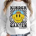 Kindergarten Teacher Hippie Smile Face Back School Women Crewneck Sweatshirt, funny design Kindergarten Teacher Hippie Smile Face Back School Women Crewneck Sweatshirt, funny design