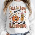 Retro Fall In Love With Learning Autumn Pumpkin Teacher Kids Women Crewneck Sweatshirt, funny design Retro Fall In Love With Learning Autumn Pumpkin Teacher Kids Women Crewneck Sweatshirt, funny design