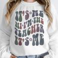 Retro IT'S ME Hi I'm The TEACHER Groovy Testing Squad Pink Women Crewneck Sweatshirt, Groovy Teacher Gifts, funny design