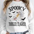 Spooky Toddler Teacher Halloween School Women Crewneck Sweatshirt, funny design Spooky Toddler Teacher Halloween School Women Crewneck Sweatshirt, funny design
