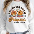 I Teach The Cutest Pumpkins In The Patch Halloween Teacher For Men Women Kids Women Crewneck Sweatshirt, funny design