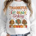 Teach Thanksgiving Teacher Thankful For My 1st Grade Turkeys Women Crewneck Sweatshirt, funny design Teach Thanksgiving Teacher Thankful For My 1st Grade Turkeys Women Crewneck Sweatshirt, funny design