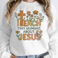 I Teach Tiny Humans About Jesus Christian Teacher Religious Women Crewneck Sweatshirt, funny design I Teach Tiny Humans About Jesus Christian Teacher Religious Women Crewneck Sweatshirt, funny design