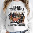 I Teach Young People About Dead-People History Teachers Women Crewneck Sweatshirt, History Teacher Gifts, funny design I Teach Young People About Dead-People History Teachers Women Crewneck Sweatshirt, History Teacher Gifts, funny design
