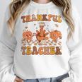 Thankful Teacher Retro Groovy Thanksgiving Fall Women Men Women Crewneck Sweatshirt, Groovy Teacher Gifts, funny design Thankful Teacher Retro Groovy Thanksgiving Fall Women Men Women Crewneck Sweatshirt, Groovy Teacher Gifts, funny design