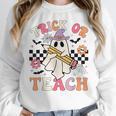 Trick Or Teach Groovy Teacher Halloween Retro Floral Ghost Women Crewneck Sweatshirt, Groovy Teacher Gifts, funny design