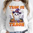 Trick Or Teach Teacher Halloween Ghost Pencil Floral Women Crewneck Sweatshirt, funny design