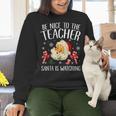 Be Nice To The Teacher Santa Is Watching School Christmas Women Crewneck Sweatshirt, gift for family, gift for coworker Be Nice To The Teacher Santa Is Watching School Christmas Women Crewneck Sweatshirt, gift for family, gift for coworker