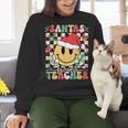 Santas Favorite Teacher Retro Groovy Smile Face Christmas Women Crewneck Sweatshirt, Groovy Teacher Sweatshirts, gift for family, gift for coworker