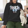 Teach Teacher Coquette Bow Pencil Back To School First Day Women Crewneck Sweatshirt, gift for family, gift for coworker Teach Teacher Coquette Bow Pencil Back To School First Day Women Crewneck Sweatshirt, gift for family, gift for coworker