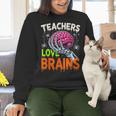 Teachers Love Brains Halloween 2025 Skeleton Costume Women Crewneck Sweatshirt, gift for family, gift for coworker Teachers Love Brains Halloween 2025 Skeleton Costume Women Crewneck Sweatshirt, gift for family, gift for coworker