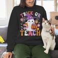 Trick Or Teach Groovy Teacher Ghost Halloween Teacher Women Crewneck Sweatshirt, Groovy Teacher Sweatshirts, gift for family, gift for coworker Trick Or Teach Groovy Teacher Ghost Halloween Teacher Women Crewneck Sweatshirt, Groovy Teacher Sweatshirts, gift for family, gift for coworker
