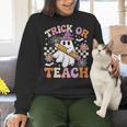 Trick Or Teach Groovy Teacher Halloween Retro Ghost Women Crewneck Sweatshirt, Groovy Teacher Sweatshirts, gift for family, gift for coworker