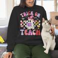 Trick Or Teach Halloween Teacher Floral Ghost Groovy Women Crewneck Sweatshirt, Groovy Teacher Sweatshirts, gift for family, gift for coworker Trick Or Teach Halloween Teacher Floral Ghost Groovy Women Crewneck Sweatshirt, Groovy Teacher Sweatshirts, gift for family, gift for coworker