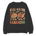 Fall In Love With Learning Retro Autumn Thanksgiving Teacher Women Crewneck Sweatshirt, novelty gifts, funny gifts Fall In Love With Learning Retro Autumn Thanksgiving Teacher Women Crewneck Sweatshirt, novelty gifts, funny gifts